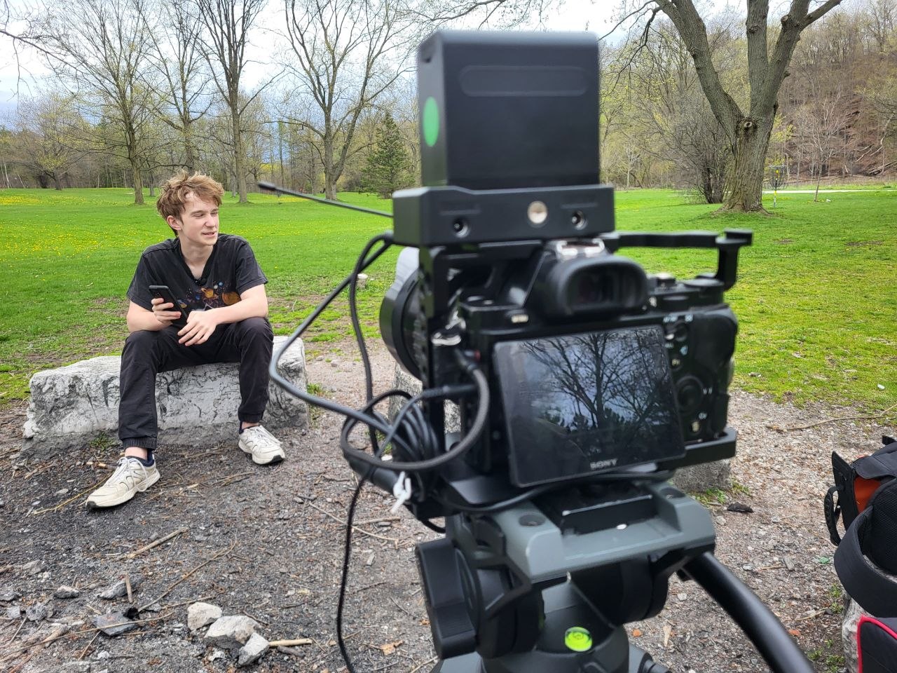 Cinema camera on tripod during an outdoor narrative shoot